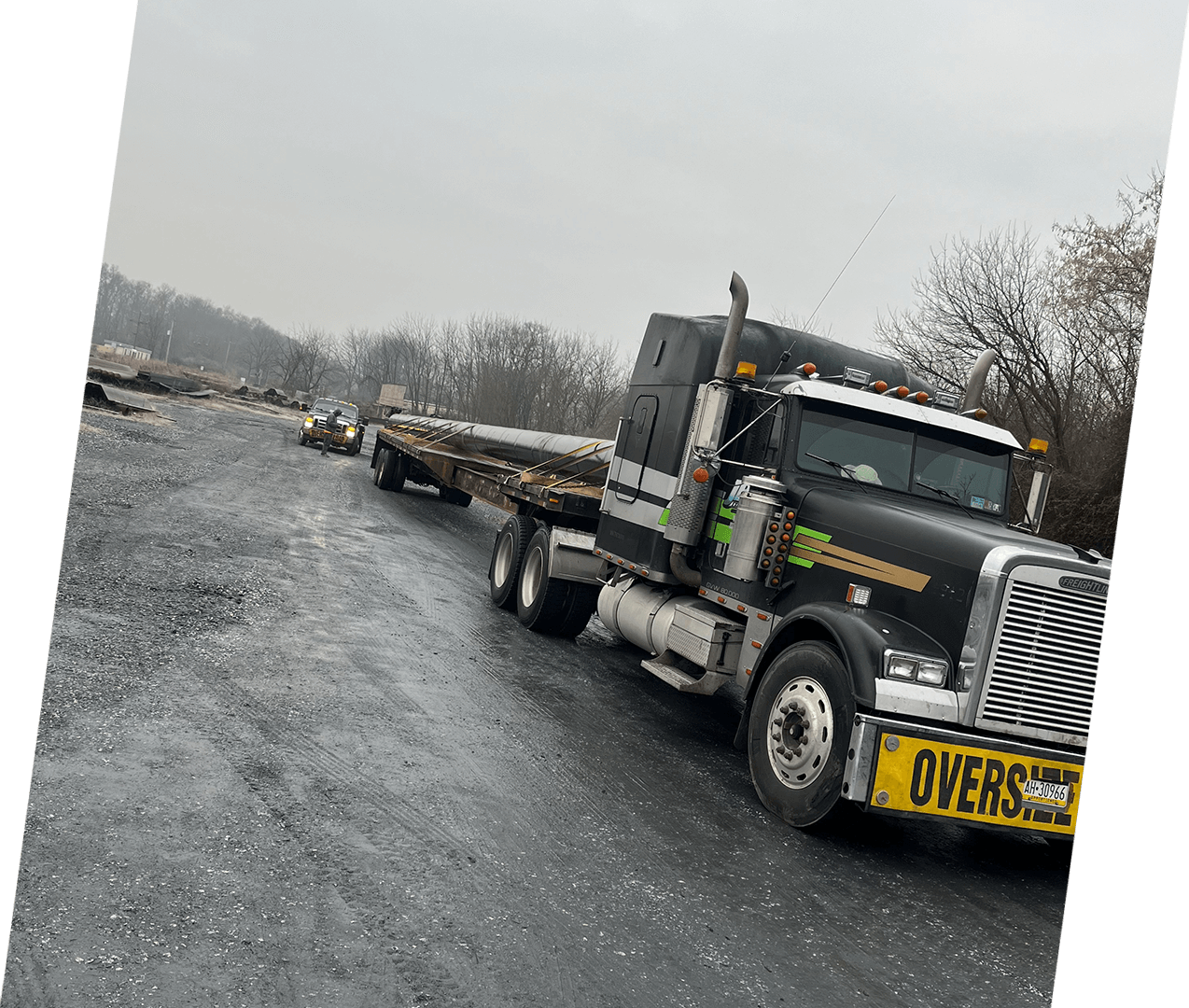 A large truck is parked on the side of the road.