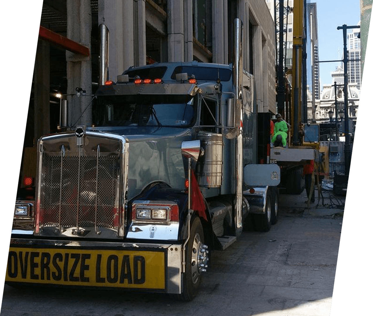 A large truck is parked on the side of the road.