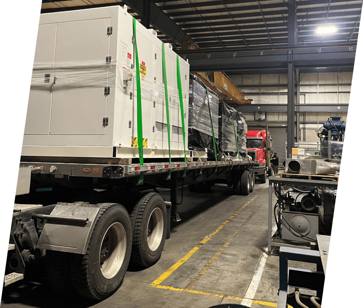 A truck with many boxes on it in a warehouse.